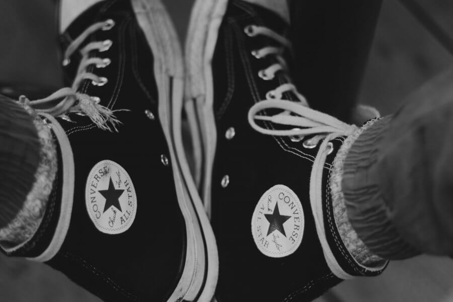 a pair of chuck taylors / converse shoes.